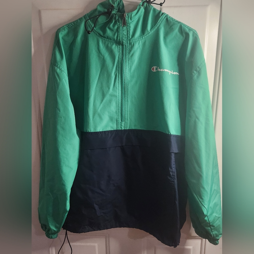 Champion brand Color Block green and blue half Zip packable jacket. 